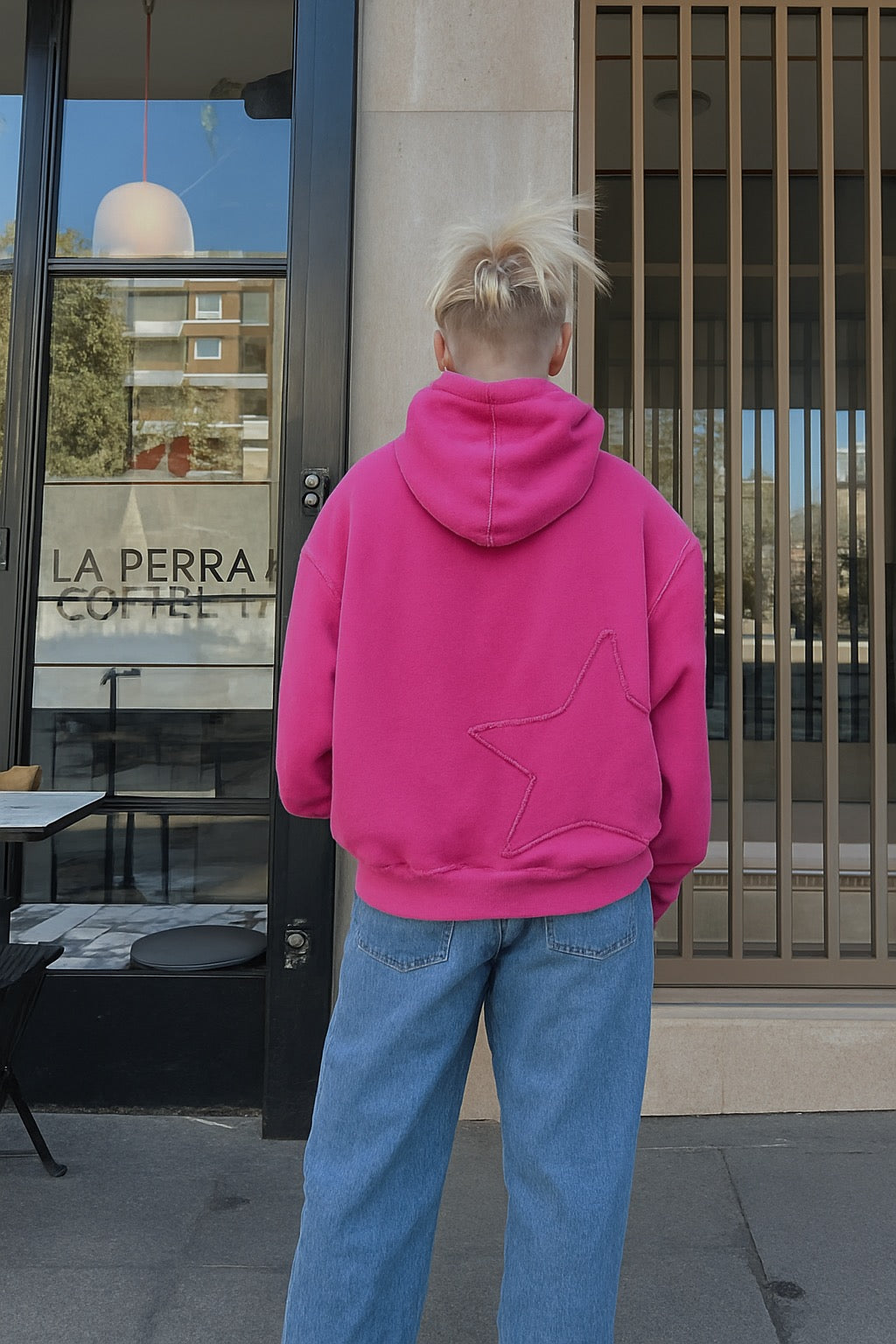 Poleron rosado con gorro desgastado estrella en espalda
